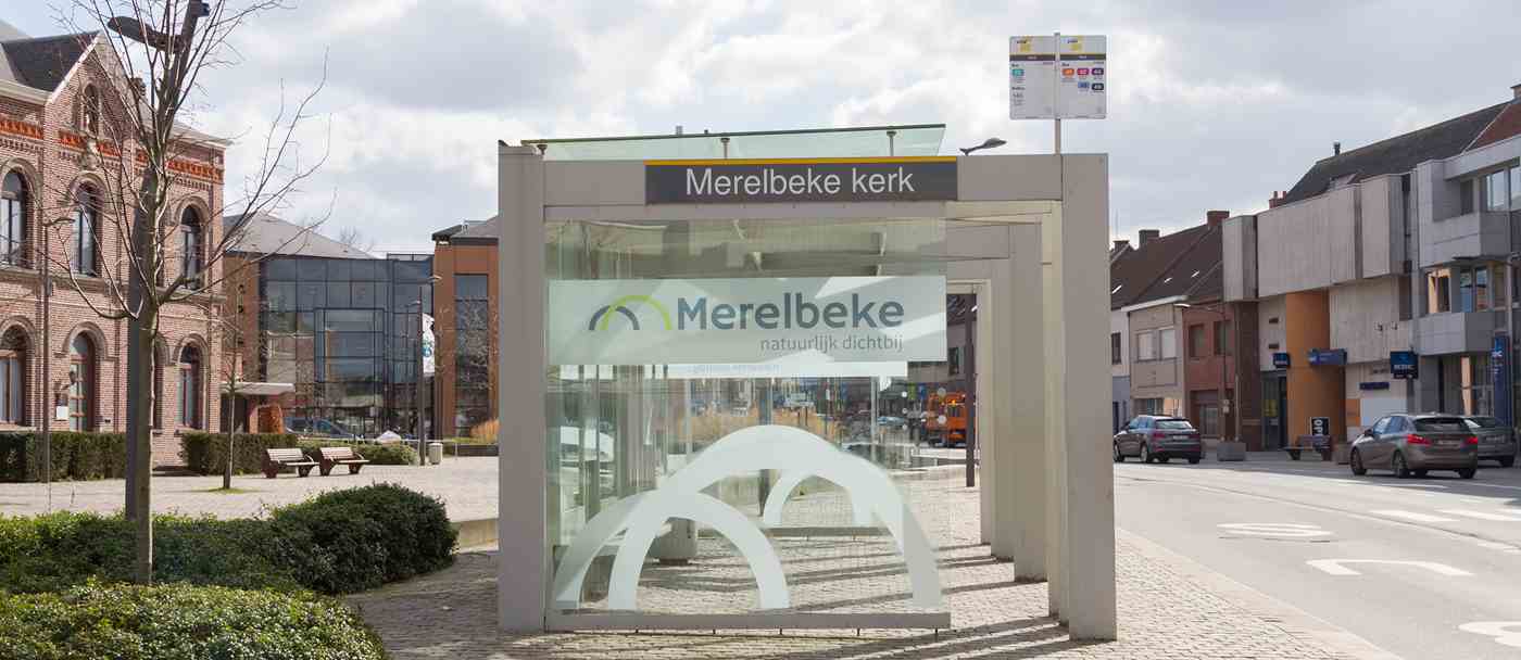 Community Merelbeke logo bus shelter